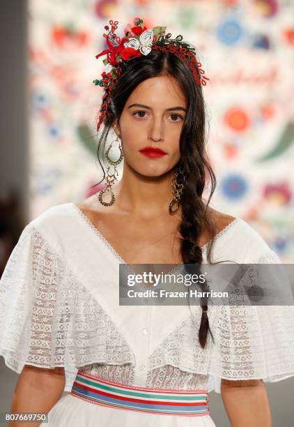 Model walks the runway at the Lena Hoschek show during the Mercedes-Benz Fashion Week Berlin Spring/Summer 2018 at Kaufhaus Jandorf on July 4, 2017...