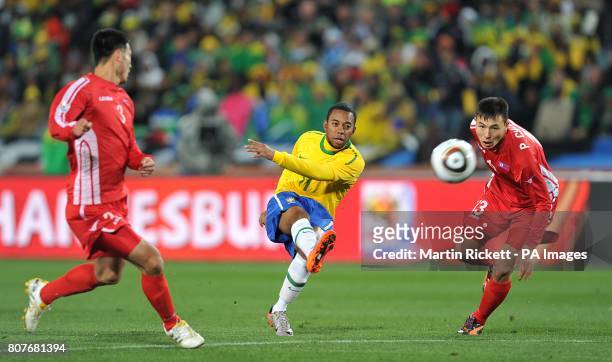 Brazil's De Souza Robinho has a shot on goal