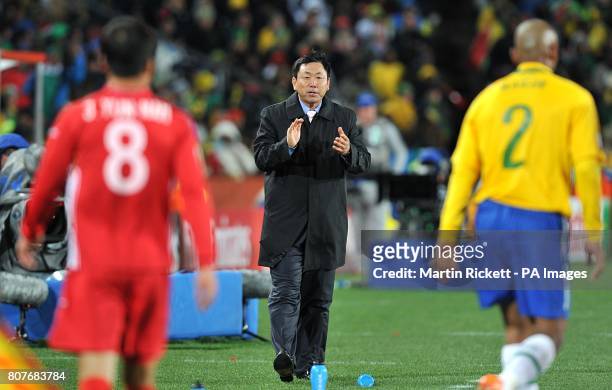 North Korea coach Jong-hun Kim gestures on the touchline