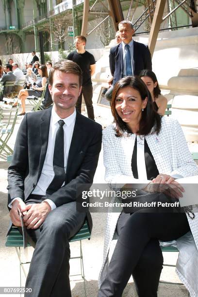 First Deputy Mayor of Paris, responsible for culture Bruno Julliard and Mayor of Paris Anne Hidalgo attend the Chanel Haute Couture Fall/Winter...