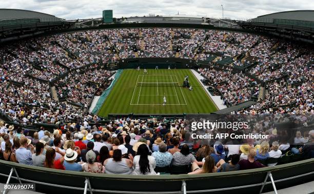 Picture taken from the roof of No. 1 court shows Canada's Milos Raonic play against Germany's Jan-Lennard Struff during their men's singles first...