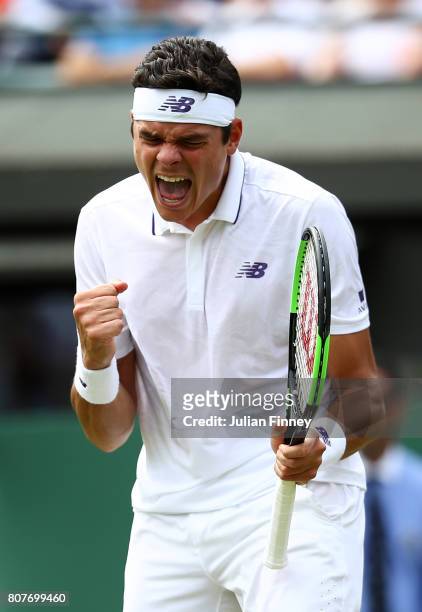 Milos Raonic of Canada celebrates victory after the Gentlemen's Singles first round match against Jan-Lennard Struff of Germany on day two of the...