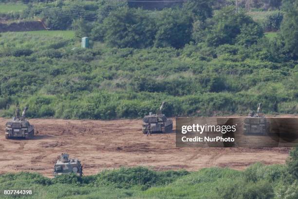 South Korean army's K-9 self-propelled howitzers move during an annual exercise in Paju, near the border with North Korea, South Korea, Tuesday, July...