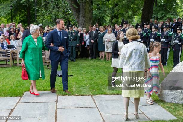Princess Astrid of Norway, Prince Haakon of Norway, Maud Angelica Behn of Norway, Emma Tallulah Behn of Norway and Queen Sonja of Norway attend the...