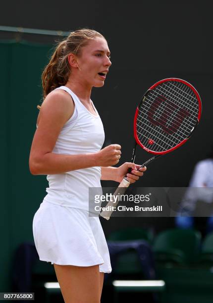 Ekaterina Alexandrova of Russia reacts during the Ladies Singles first round match against Garbine Muguruza of Spain day two of the Wimbledon Lawn...