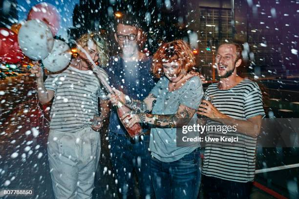 group of friends celebrating - party champagne stock-fotos und bilder