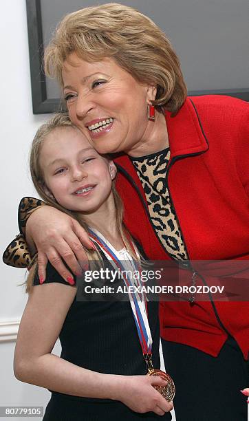 St. Petersburg Governor Valentina Matviyenko hugs US karate fighter Samantha Smith from Pennsylvania in St. Petersburg on April 19, 2008 during a...