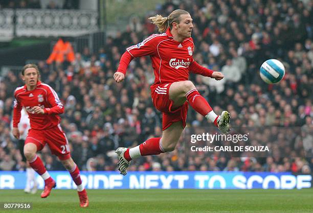 Liverpool's Ukranian forward Andriy Voronin controls the ball during the Premiership football match against Fulham at home to Fulham at Craven...