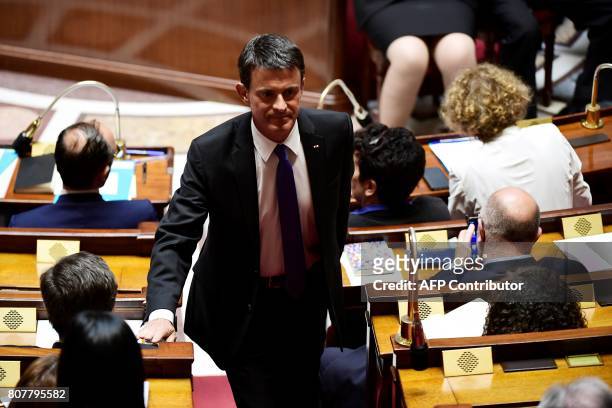 Former French prime minister and Member of Parliament Manuel Valls walks to his seat within the address of the French Prime Minister's general policy...
