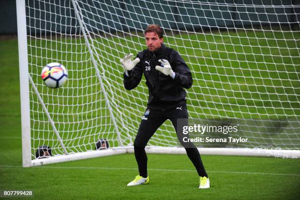 Goalkeeper Tim Krul catches the ball during the Newcastle United Training Session at the Newcastle United Training Centre on July 4, 2017 in...