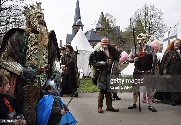 Few visitors of the Elf Fantasy Fair pose in Haarzuilens, on April 19 dressed as their favourite fantasy figure. Fantasy lovers gather this weekend...