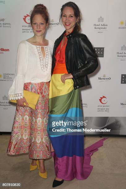 Tessa Mittelstaedt and Nike Fuhrmann attend the Anja Gockel show during the Mercedes-Benz Fashion Week Berlin Spring/Summer 2018 at Hotel Adlon on...