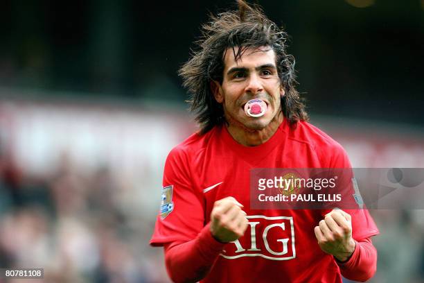 Manchester United's Argentinian forward Carlos Tevez celebrates scoring against Blackburn Rovers during their English Premier League football match...