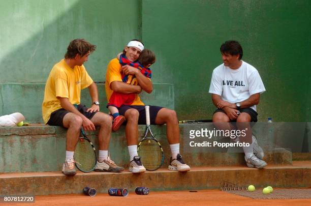 Rafael Nadal of Spain with his Coach and Uncle, Toni Nadal , taking a break during a practice session at the 'Club Tenis Manacor' in Majorca, Spain...