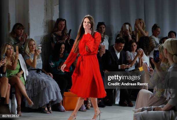 Designer Ewa Herzog acknowledges the applause of the audience at the Ewa Herzog show during the Mercedes-Benz Fashion Week Berlin Spring/Summer 2018...