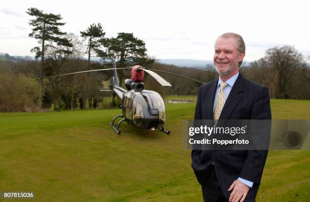 English businessman and Chairman of Birmingham City David Gold with his private helicopter in the grounds of his home in Surrey on the 19th April,...