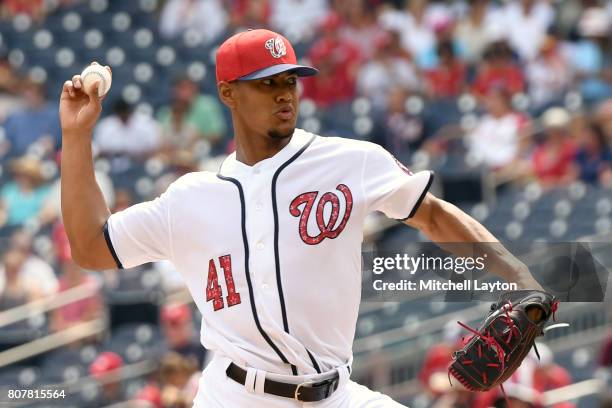 Joe Ross of the Washington Nationals pitches in the first inning during a baseball game against the New York Mets at Nationals Park on July 4, 2017...