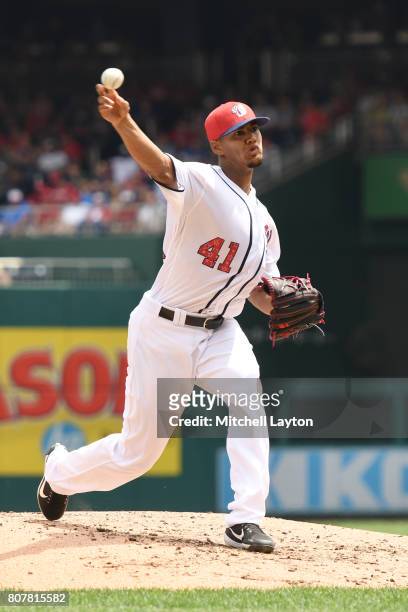 Joe Ross of the Washington Nationals pitches in the third inning during a baseball game against the New York Mets at Nationals Park on July 4, 2017...