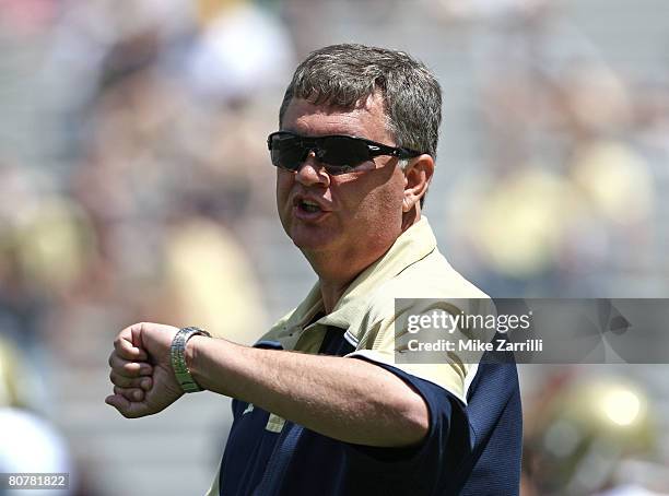 Georgia Tech Yellow Jackets head coach Paul Johnson questions the correct clock time during the third quarter of the Georgia Tech T-Day Spring...