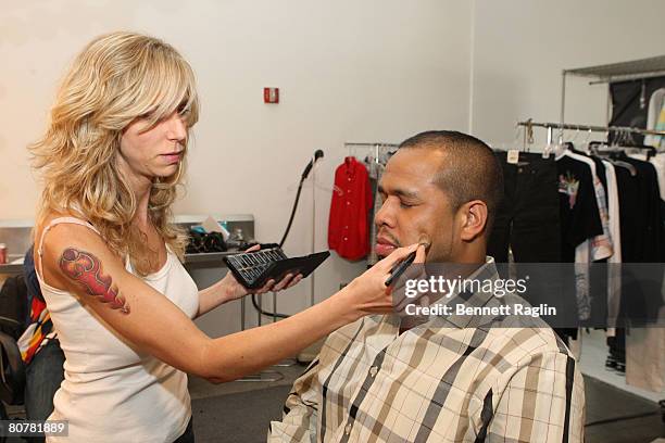 Celebrity photographer Johnny Nunez and a make-up artist, during the Rockport photoshoot at Studio 59, April 18 New York City.