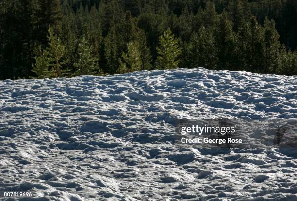 Thick layer of snow still covers the meadows adjacent to Highway 120 near Tioga Pass on June 28 near Lee Vining, California. Following a five-year...