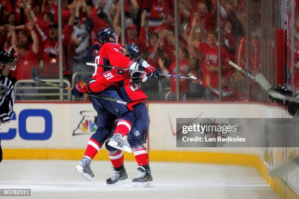 Alexander Semin Sergei Fedorov of the Washington Capitals celebrates Semin's 3rd period goal against the Philadelphia Flyers during game five of the...