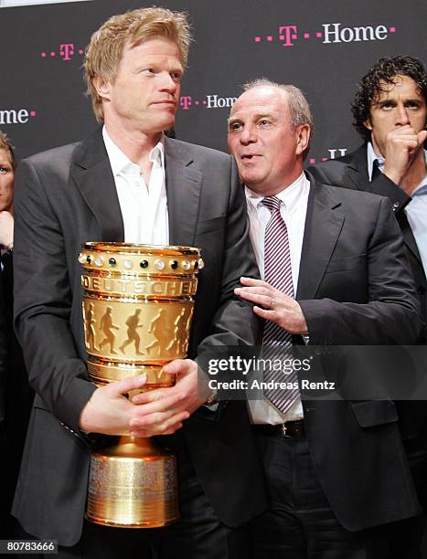 Oliver Kahn and Uli Hoeness , Manager of Bayern Munich, look on during the Bayern Munich champions party after the DFB Cup Final match between...