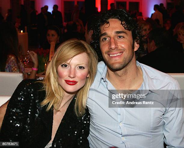 Luca Toni and girlfriend Marta Cecchetto attend the Bayern Munich champions party after the DFB Cup Final match between Borussia Dortmund and FC...