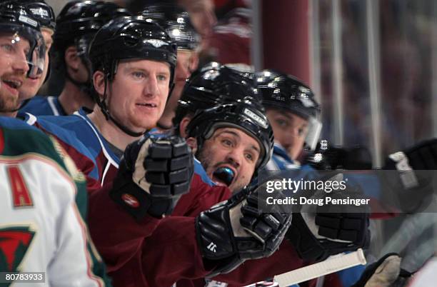 The Avalanche bench celebrate a shorthanded goal by Ben Guite of the Colorado Avalanche on goaltender Niklas Backstrom of the Minnesota Wild during...
