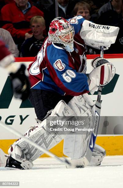 Goaltender Jose Theodore of the Colorado Avalanche clears the puck as he had 35 saves against the Minnesota Wild during Game Six of the 2008 NHL...