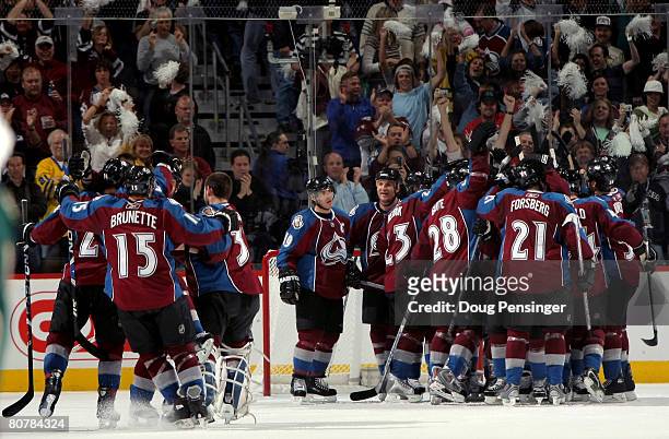 The Colorado Avalanche celebrate after defeating the Minnesota Wild during Game Six of the 2008 NHL Western Conference Quarterfinals on April 19,...