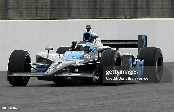 Danica Patrick in her Motorola Andretti Green Racing Honda Dallara pumps her fist as she crosses the finish line to win the IndyCar Series...