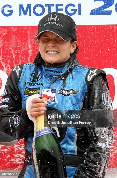 Danica Patrick driver of the Motorola Andretti Green Racing Honda Dallara sprays champagne after winning the IndyCar Series Bridgestone Indy Japan...