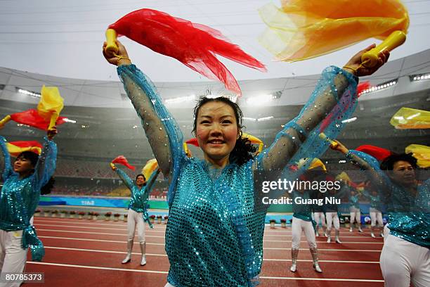 Chinese entertainers rehearse a traditional performance ahead of the "Good Luck Beijing" 2008 Marathon Competition at the National Stadium, or the...