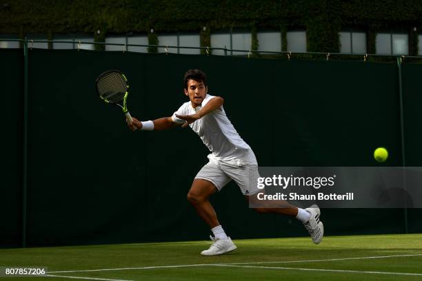 Christian Garin of Chile plays a forehand during the Gentlemen's Singles first round match against Jack Sock of The United States on day two of the...