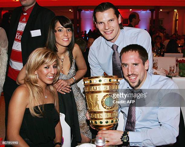 Bayern Munich's French midfielder Franck Ribery , his wife Wahiba Ribery , Belgian defender Daniel van Buyten and his girlfriend Celine pose with the...