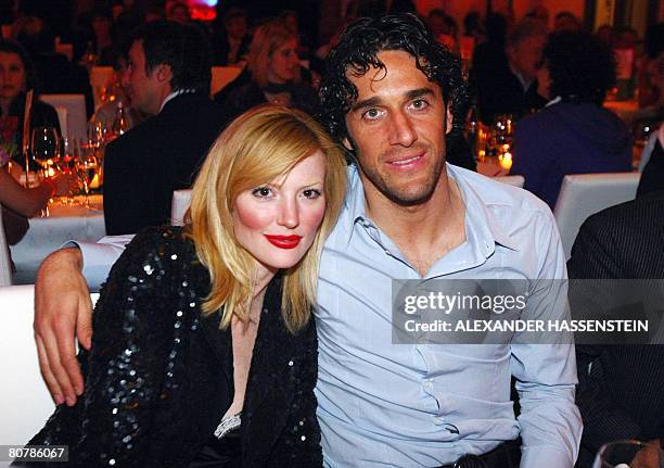 Bayern Munich's Italian striker Luca Toni and his girlfriend Italian model Marta Cecchetto pose on early April 20, 2008 during the Bayern Munich...