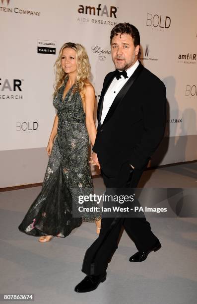 Russell Crowe and wife Danielle Spencer arriving for the amfAR Cinema Against AIDS 2010 fundraiser at the Hotel Du Cap, Eden Roc, Cap D'Antibes...