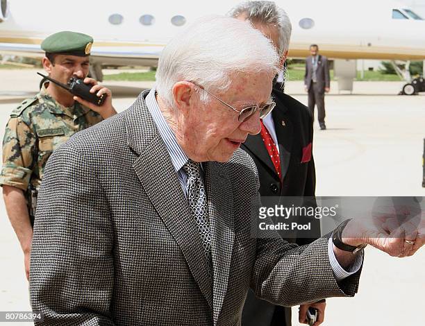 Former US President Jimmy Carter arrives at Queen Alia International airport on April 20, 2008 in Amman, Jordan. Carter in the Middle East tour, has...
