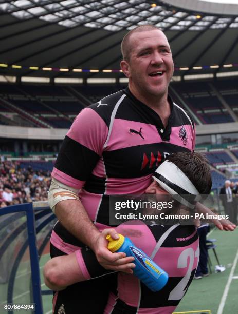 Ayr's Damien Kelly and Paul Burke celebrate winning the Scottish Hydro Premier Cup Final during the Scottish Hydro Premier Cup Final during the...