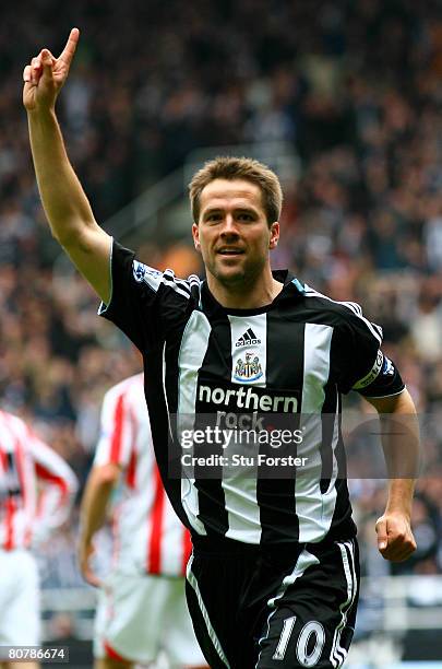 Newcastle forward Michael Owen celebrates after scoring the first goal during the Barclays Premier League Match between Newcastle United and...