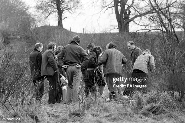 Police officer, wearing protective clothing and a mask, preparing to enter the drain at Bathpool Park, Kidsgrove, where police found the body of of a...