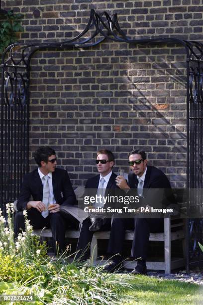 Craig Kieswetter, Eoin Morgan and Kevin Pietersen in the garden of 10 Downing Street, London, ahead of a reception for England's world champion...