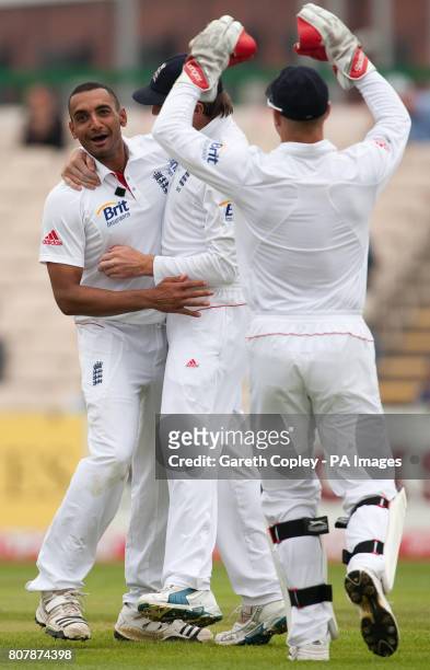 England's Ajmal Shahzad celebrates after dismissing Bangladesh's Shakib Al Hasan during the second test at Old Trafford, Manchester.