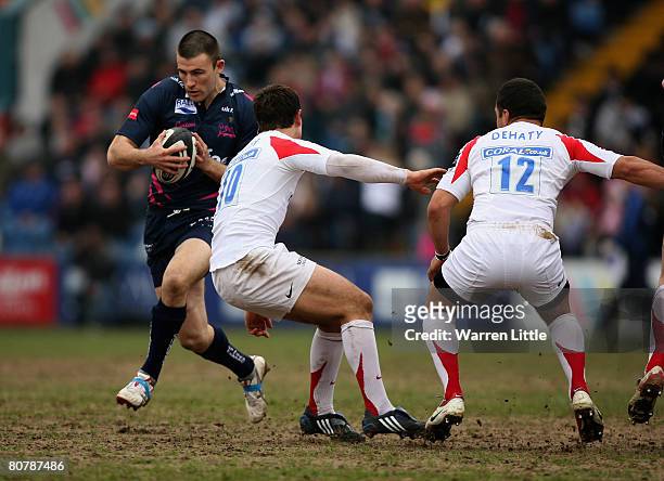 Chris Bell of Sale Sharks runs through the Newcastle defence to score a try during the Guinness Premiership match between Sale Sharks and Newcastle...