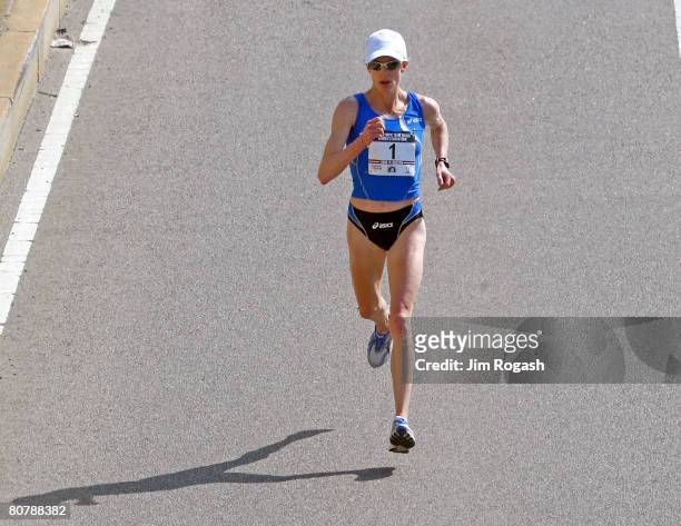 Deena Kastor takes the lead from Magdalena Lewy-Boulet in the U.S. Women's Olympic Marathon Trials run along the Charles River April 20, 2008 in...