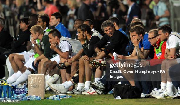 The England bench look on during the training match at Moruleng Stadium, Moruleng, South Africa.