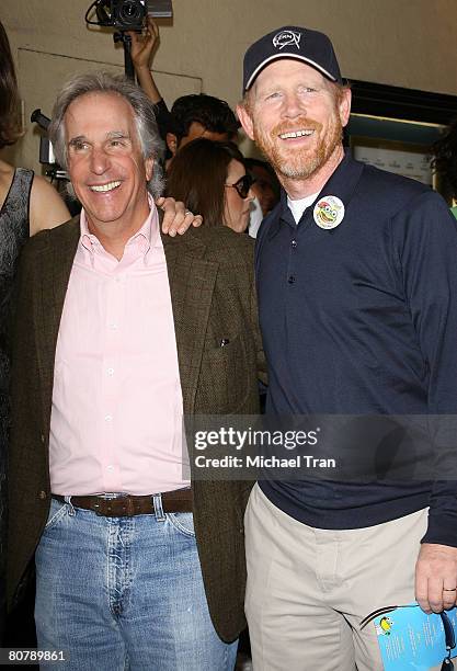 Actor/director Henry Winkler and director Ron Howard arrive at the Los Angeles Premiere of "A Plumm Summer" held at the Mann Bruin Theater on April...