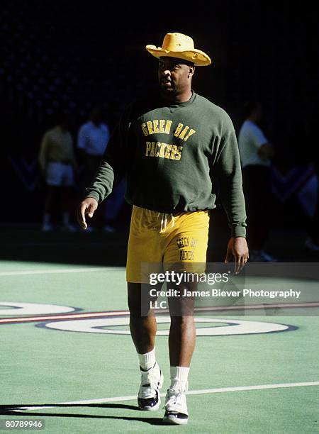 Green Bay Packers Hall of Fame defensive end Reggie White decked out in a cheesehead cowboy hat before the NFC Championship Game, a 38-27 loss to the...