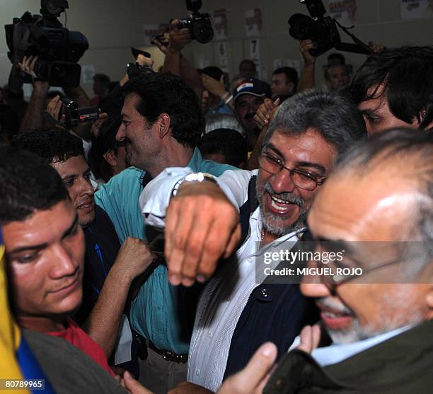 Paraguayan former Catholic bishop and presidential candidate for the Patriotic Alliance for Change party Fernando Lugo , celebrates during...